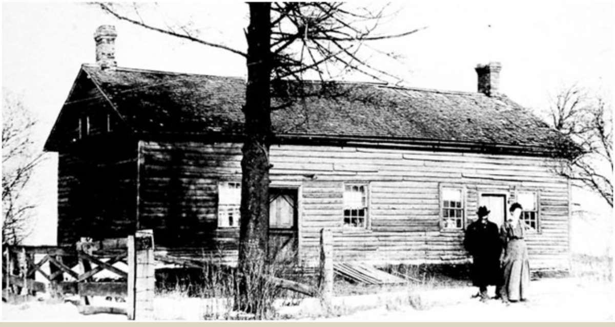 Rafferty Hotel built in the 1830s. Photo of Mr. & Mrs. Crawford, tenants in 1915.